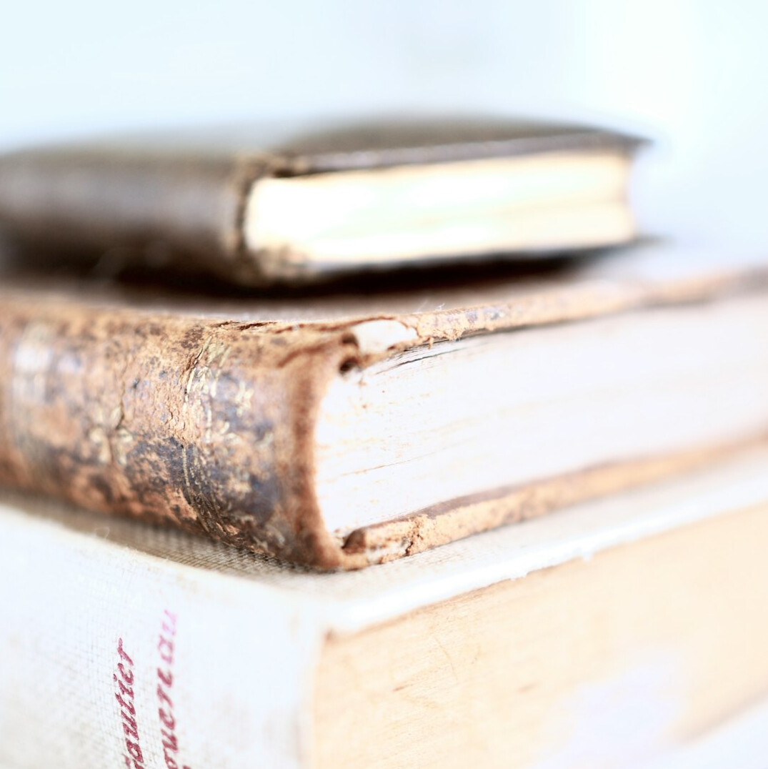 Stack of old books and notebooks
